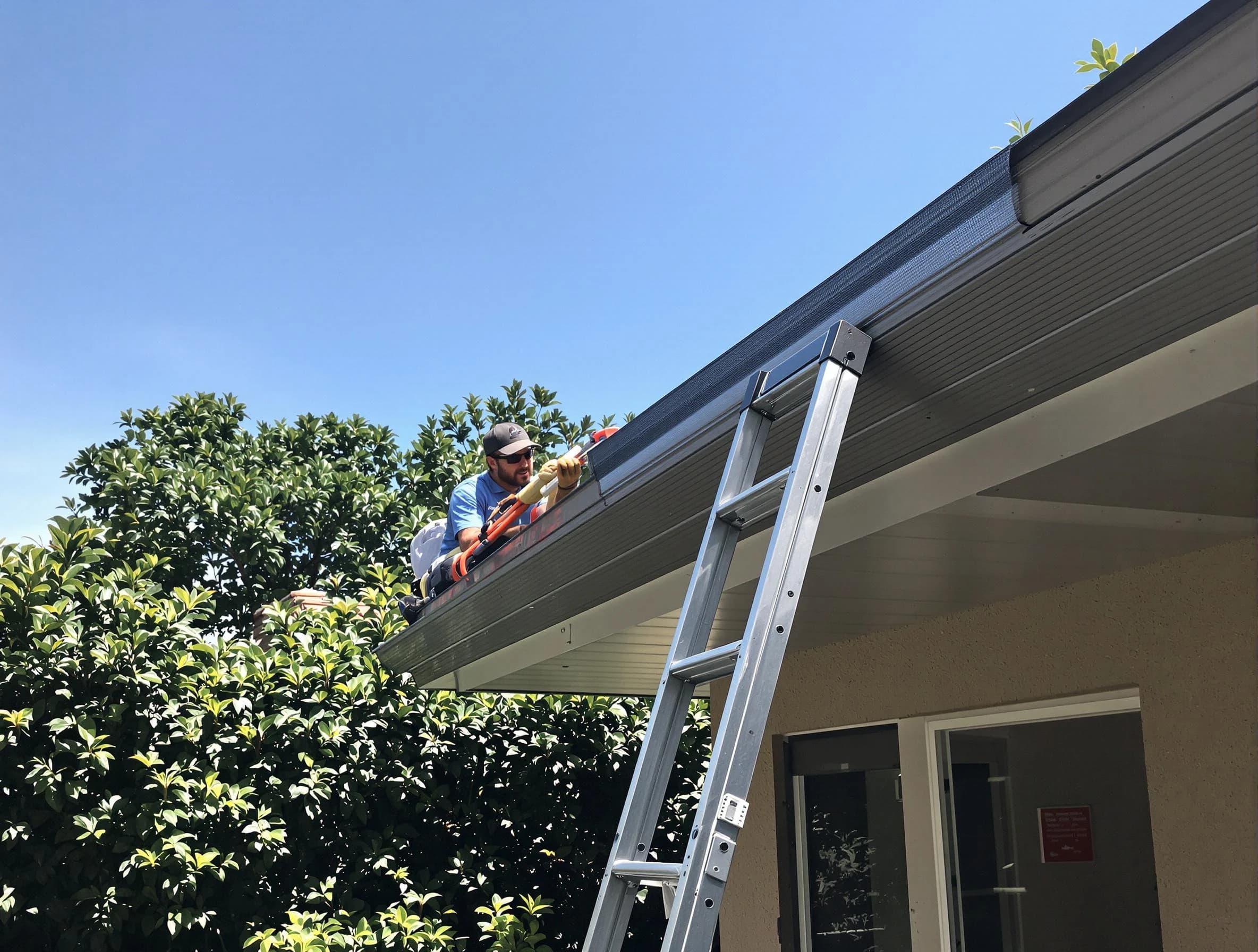 Broadview Heights Roofing Company installing gutter guards for a homeowner in Broadview Heights, OH